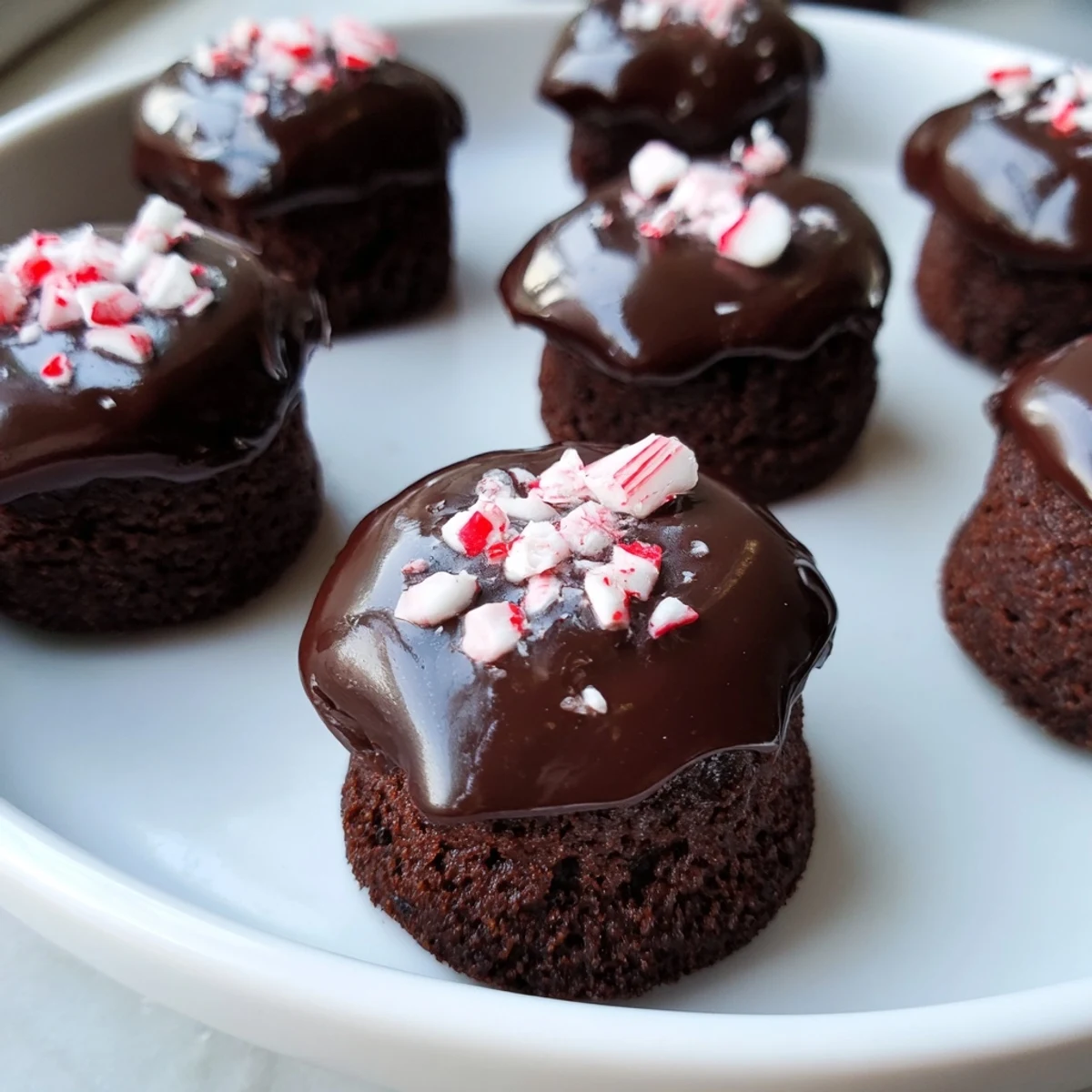 Craving chocolate? These bite-sized Mint Brownie Bites with Ganache are a perfect dessert for parties.