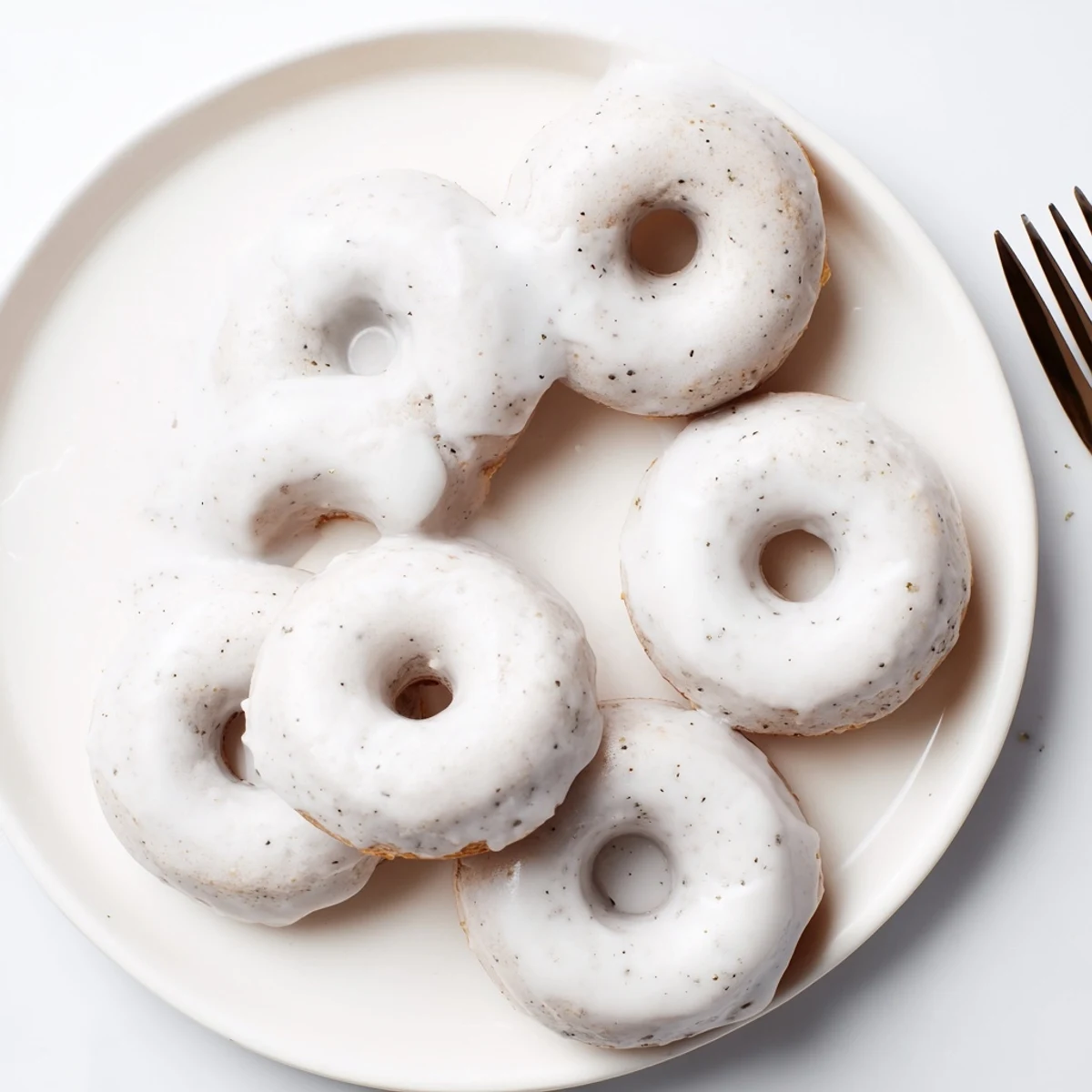Close-up shot of fluffy mochi donuts displaying signature rings and creamy Earl Grey coating
