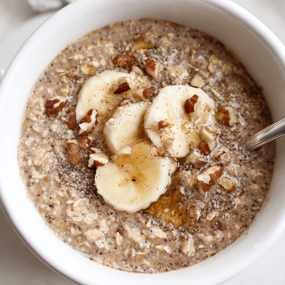 A creamy jar of Brown Sugar Coffee Overnight Oats ready for busy mornings
