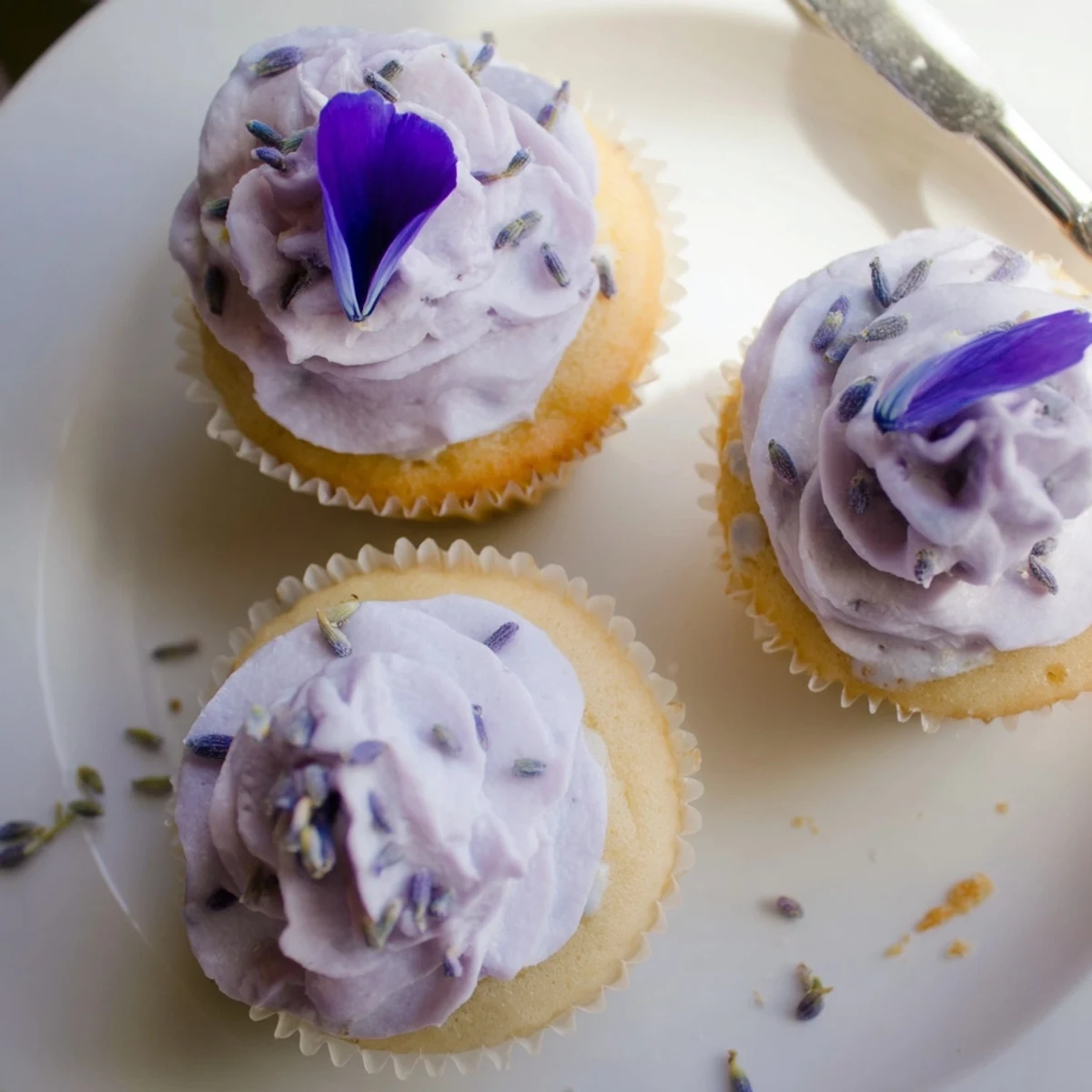 Close-up of Lavender Buttercream Floral Frosting swirled, aromatic lavender and buttery sheen.