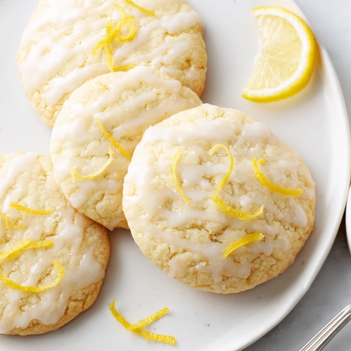 Fresh baked Lemon Cookies With Lemon Glaze arranged for spring gathering, bright aroma