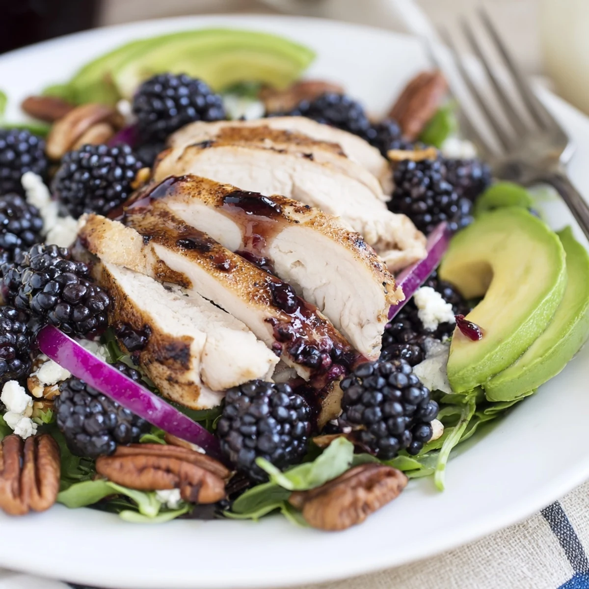 Plated Sweet Tangy Blackberry Chicken Salad Recipe for summer picnic, berries glistening.
