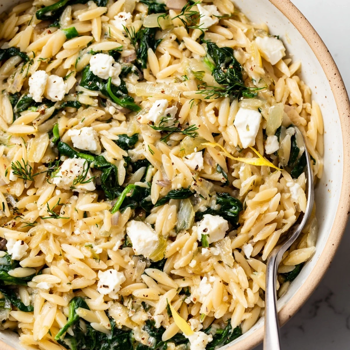 Skillet of One Pan Lemon Orzo With Spinach Feta, bright citrus aroma.