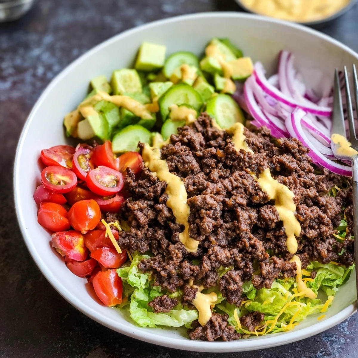 Warm Savory Protein Packed Burger Bowls with browned beef and tangy sauce