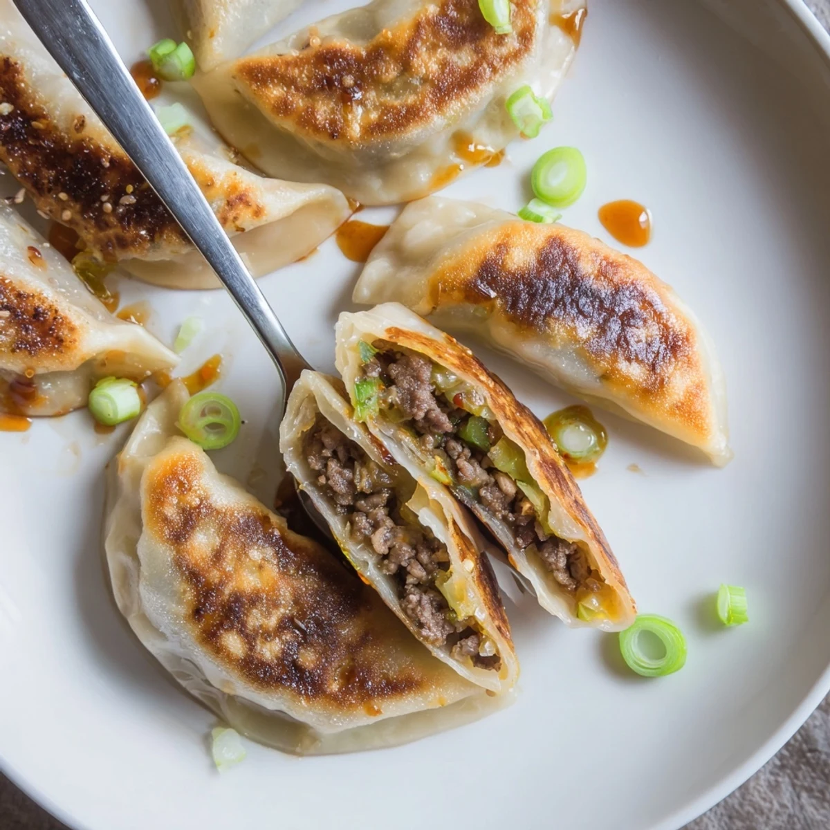 Plate of Savory Beef Mandu With Sweet Gochujang Glaze, glossy spicy honeyed coating