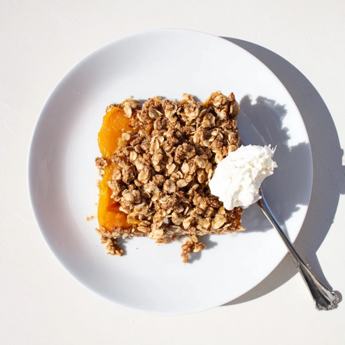 Spiced pumpkin pie crisp featuring a buttery crumbly crust baked until golden