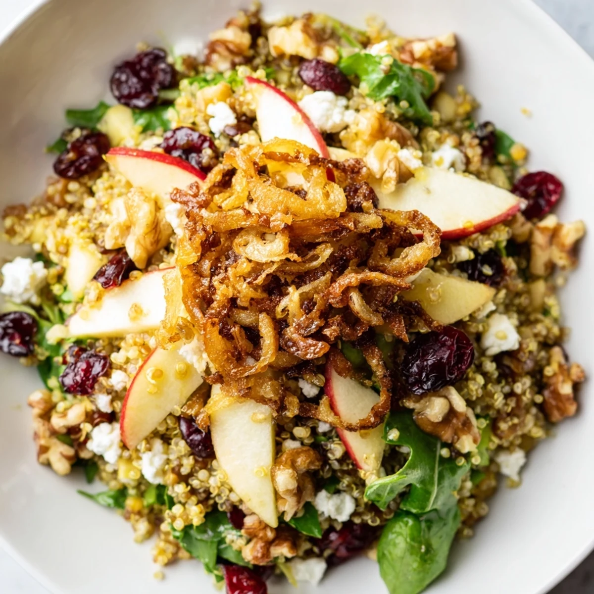 Colorful mixed greens and sweet cranberries fill this Honey Mustard Quinoa Apple Salad beautifully.