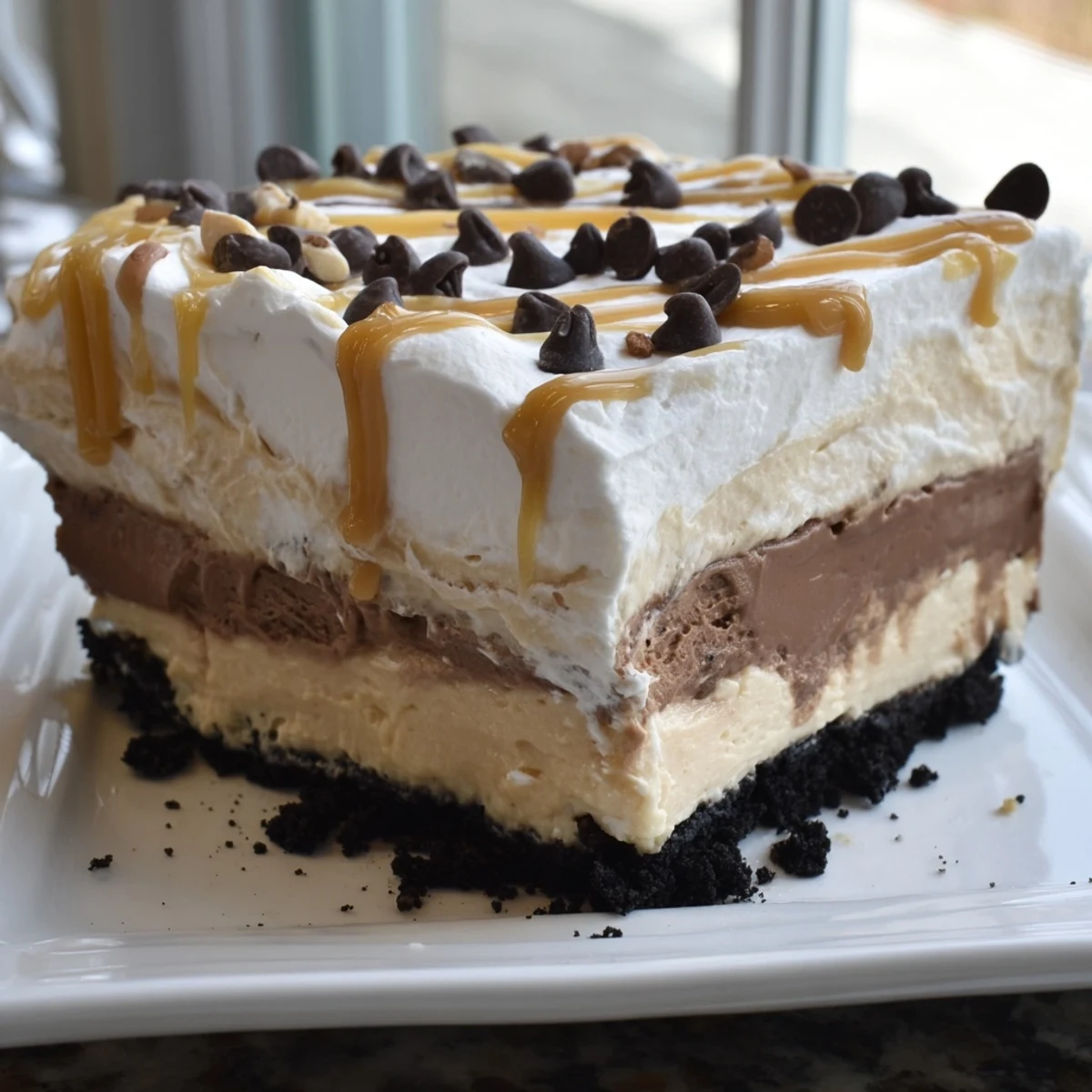 Creamy peanut butter layered delight with rich chocolate pudding and whipped topping