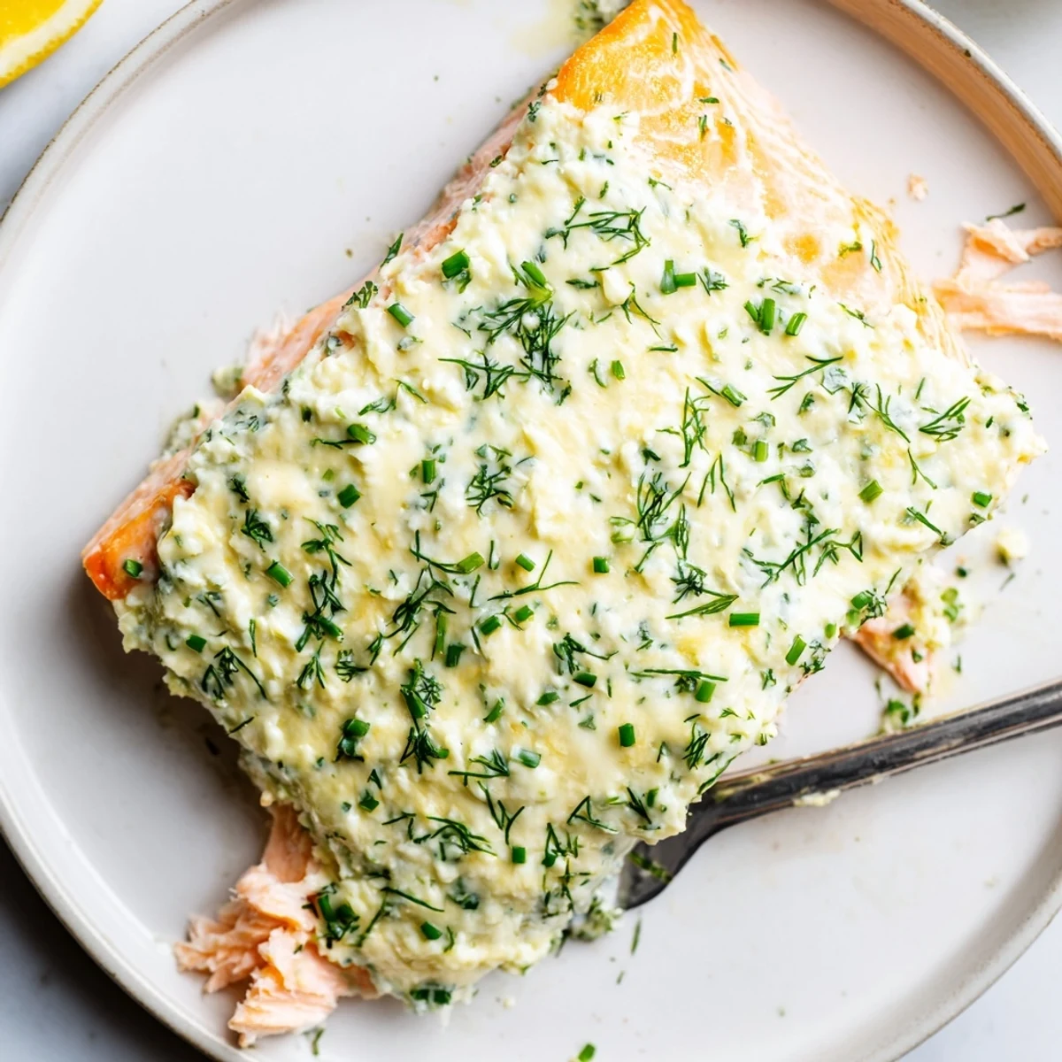 Creamy Boursin salmon fillets baked golden with fresh herbs and lemon zest