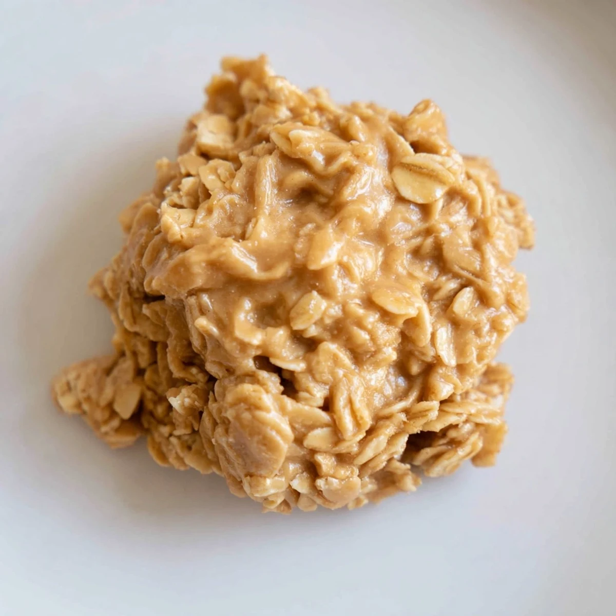 Rich chewy peanut butter no bake cookies topped with creamy oats.  